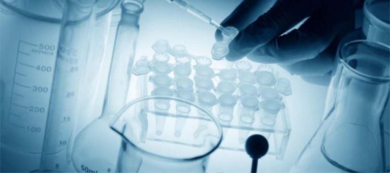 Gloved hands using a pipette over laboratory samples, tinted blue